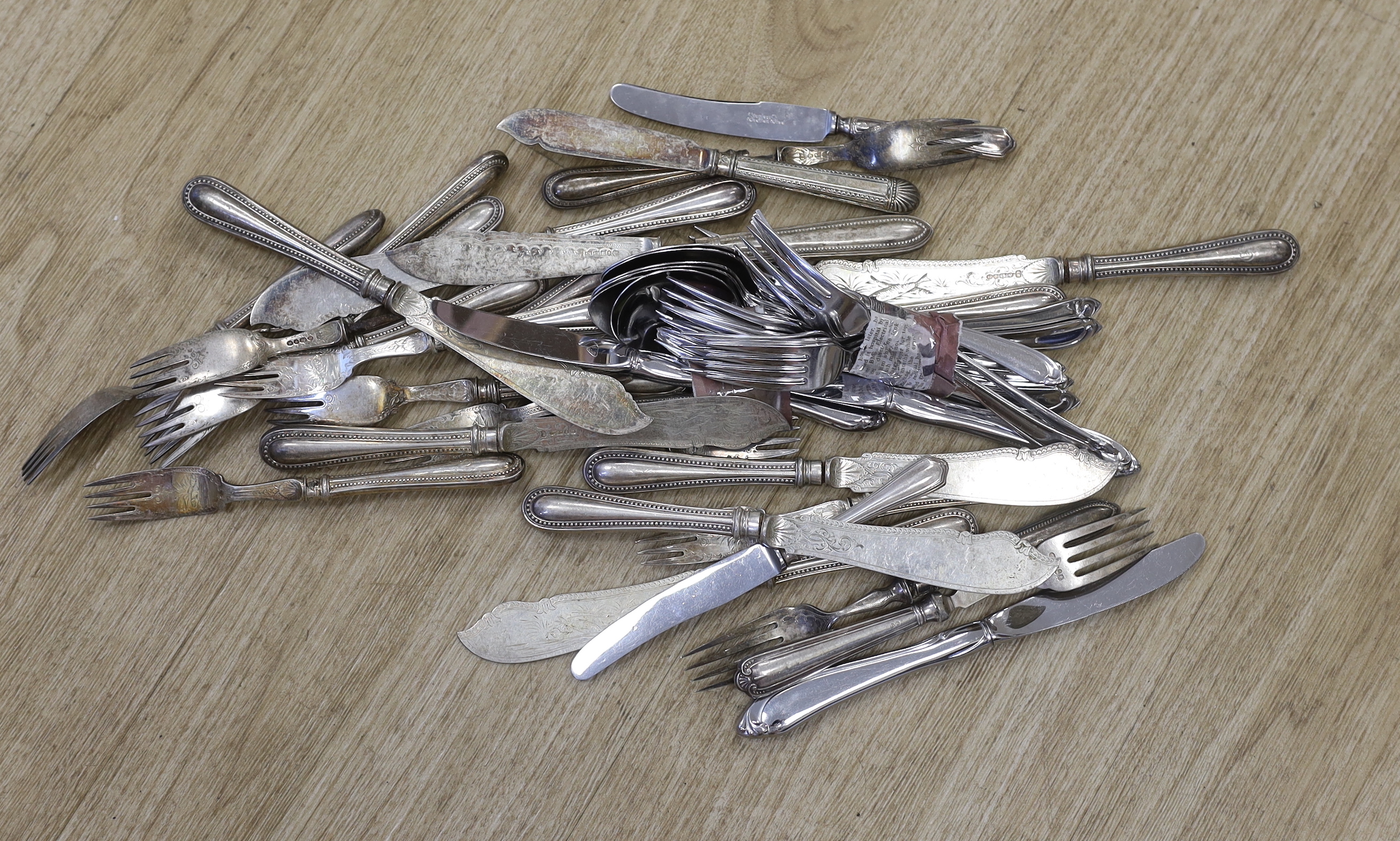 A collection of silver plated flatware including cased teaspoons, dessert knives, together with a good quantity of other uncared flatware